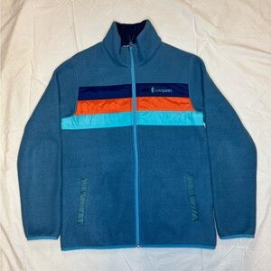 Cotopaxi Blue Fleece Jacket with Colorful Stripes